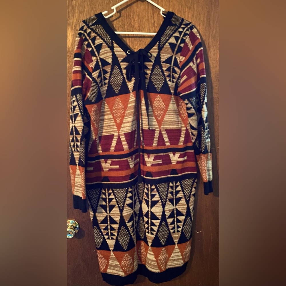 A warm beautifully printed Aztec size 18-20 sweater dress.